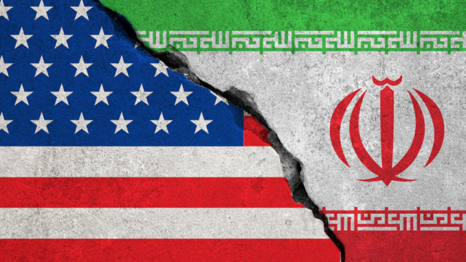iranian flag on broken wall and half usa united states of america flag